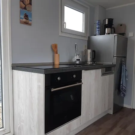 Hausboot-schwimmendes-ferienhaus-im-havelbogen-haus-auf-dem-wasser Kützkow